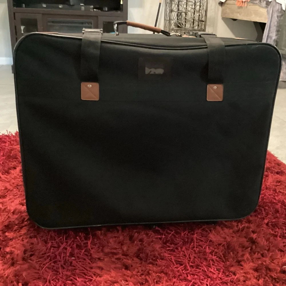 Elegant Black Travel Bag with Leather Accents